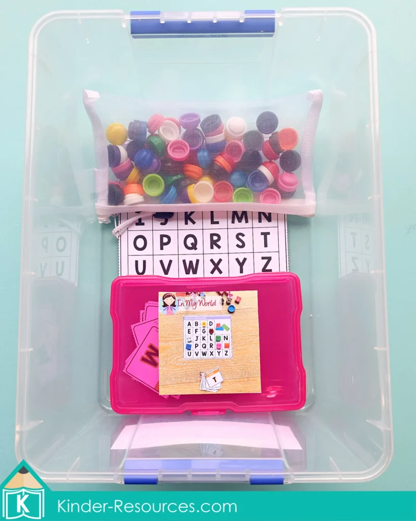 Kindergarten fine motor and alphabet matching activity using hands-on materials stored in a labeled morning tub