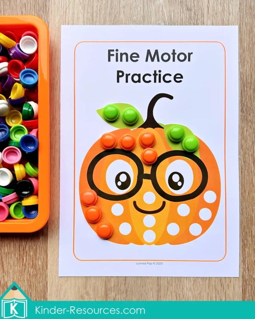 Pumpkin fine motor practice mat for preschool with snap cubes on a pumpkin printable activity sheet.