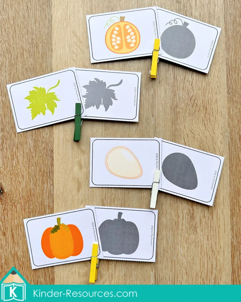 Pumpkin shadow matching activity for preschool where children clip cards to match pumpkin-themed pictures with their shadows.