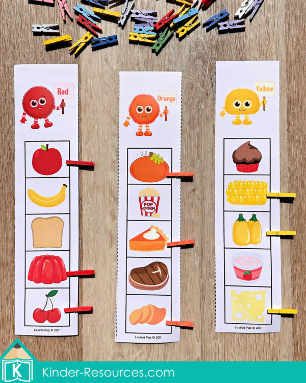 Thanksgiving color sorting activity from the Thanksgiving Math Centers for Kindergarten packet. Children clip matching colored foods—red, orange, and yellow—using small clothespins to strengthen fine motor skills and color recognition. Includes foods like apples, pumpkins, and corn. Perfect for fall-themed math or sorting centers.