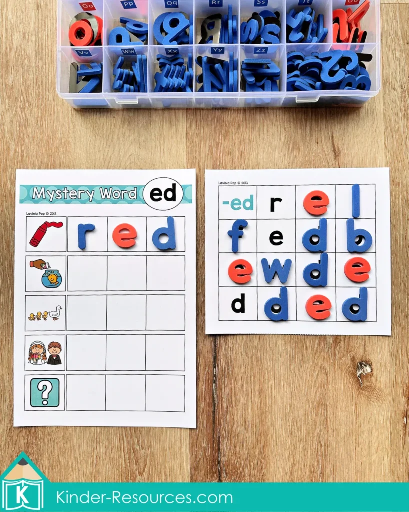 CVC word family center activity with foam letter tiles building the ED words red, fed, led, and wed on a Mystery Word mat beside a full letter tray.