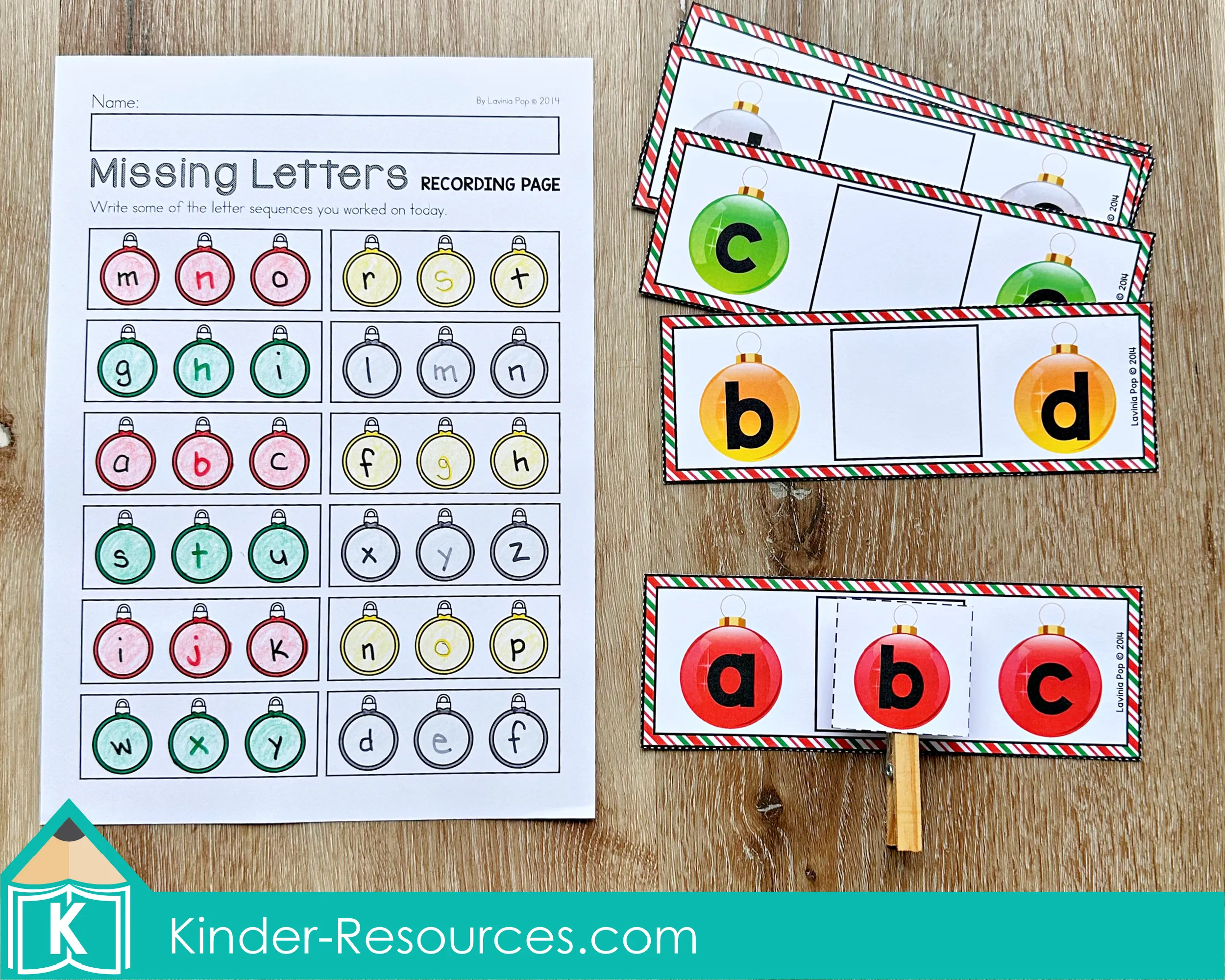 Christmas Literacy Centers for Kindergarten Missing Letters Ornaments Activity Christmas Literacy Centers for Kindergarten missing letters activity with ornament cards and recording page for alphabet sequencing.