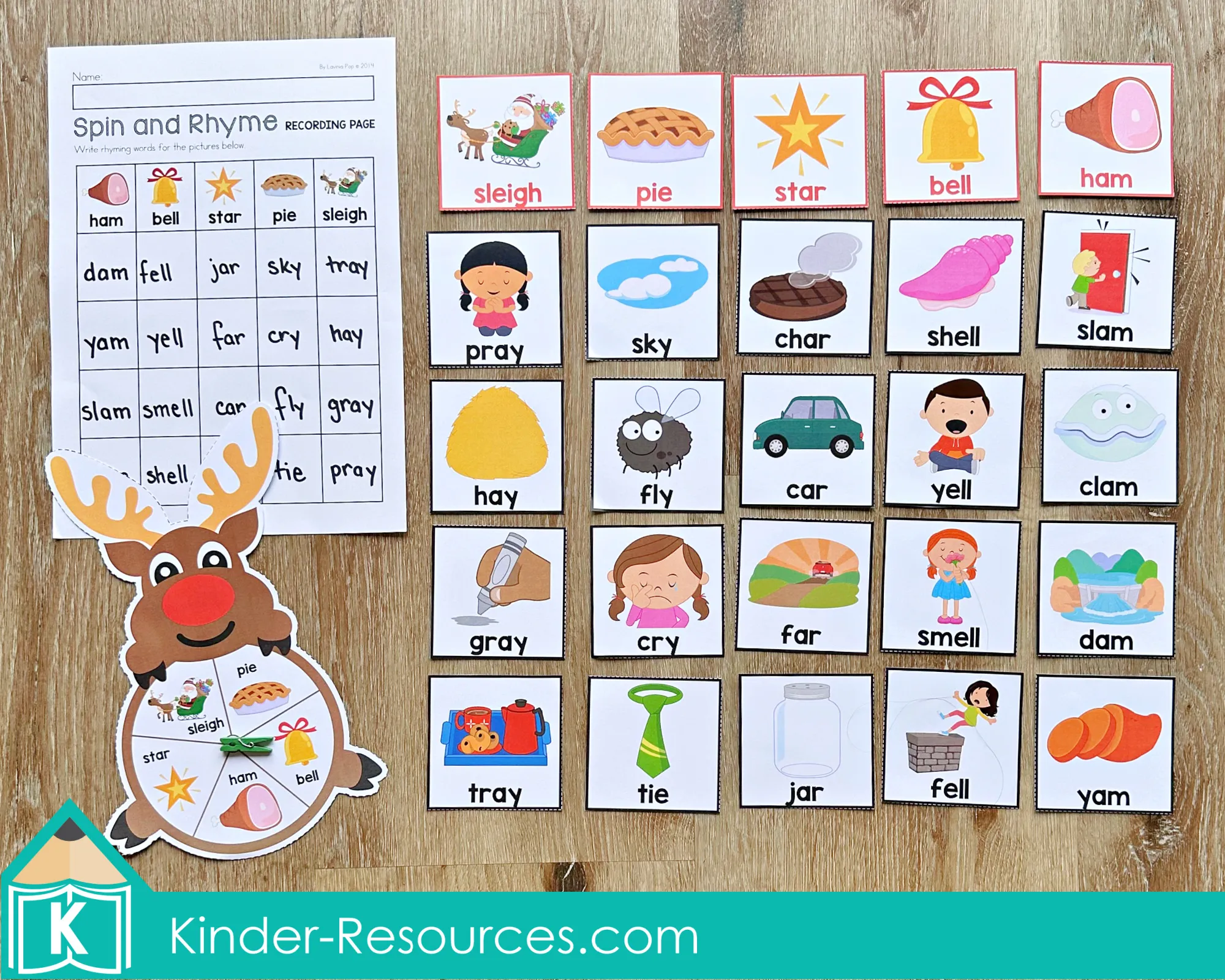 Christmas Literacy Centers for Kindergarten Reindeer Spin and Rhyme Game Christmas Literacy Centers for Kindergarten rhyming activity with reindeer spinner, picture cards, and recording page for matching rhyming words.