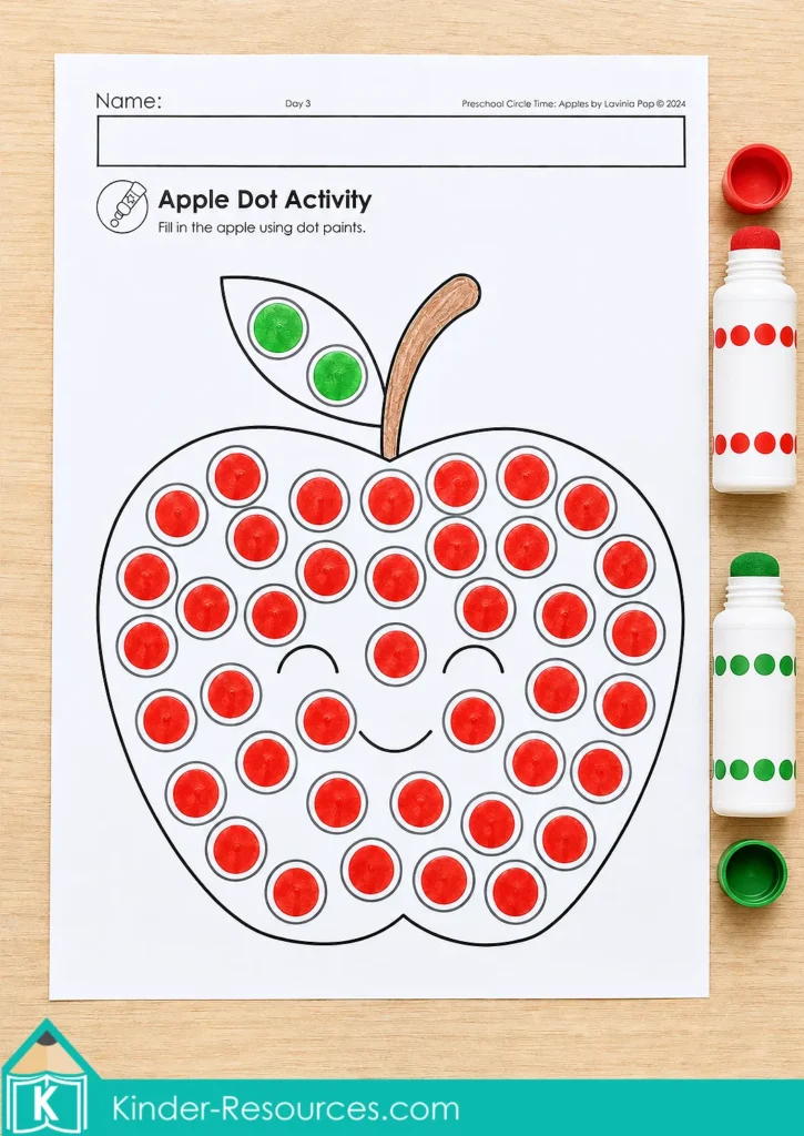 Apple dot marker worksheet for preschool filled with red dot paint on the apple and green dot paint on the leaf.