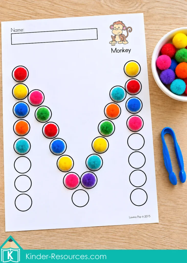 Uppercase M alphabet dot marker activity with rainbow pom poms inside the circles, a bowl of pom poms, and blue tongs.