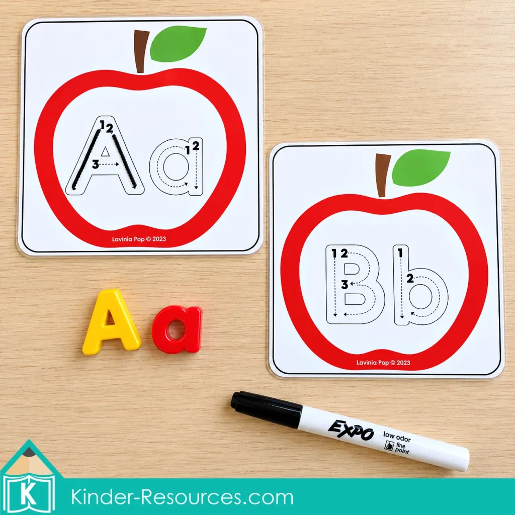 Apple centers for preschool with Aa and Bb tracing cards, letter formation arrows, magnetic letters, and a dry erase marker.