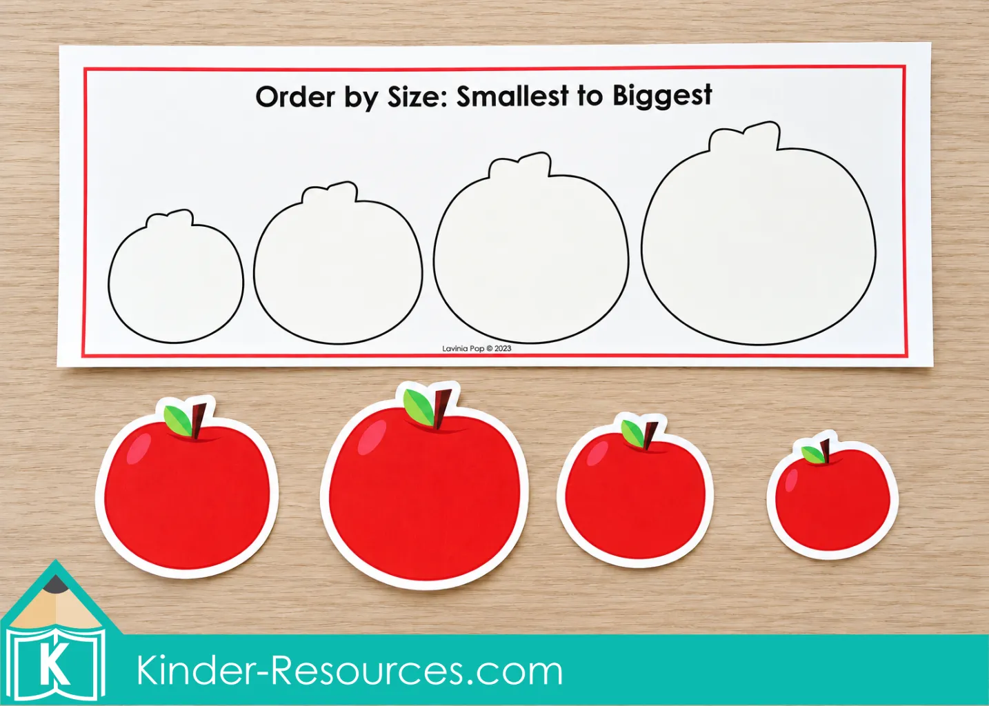 Apple centers for preschool with four differently sized red apple pieces below a sorting mat with outlines increasing from smallest to biggest.