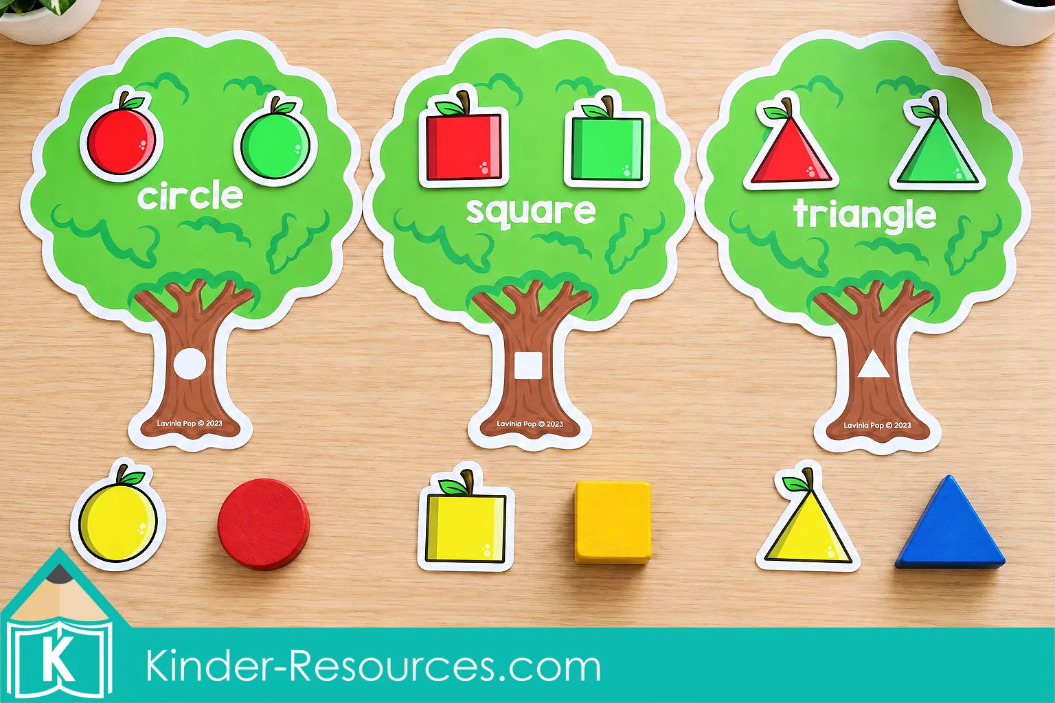 Apple centers for preschool with circle, square, and triangle trees, colorful shaped apple pieces, and matching wooden shapes.