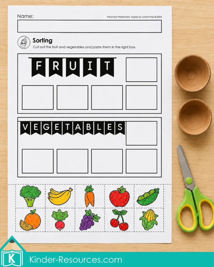 Fruit and vegetable sorting worksheet with colorful food pictures, sorting boxes, scissors.