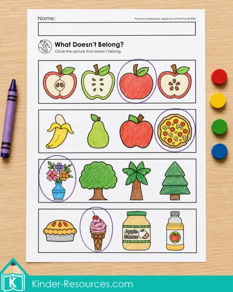 Apple-themed visual discrimination worksheet with the picture that does not belong circled in each row.