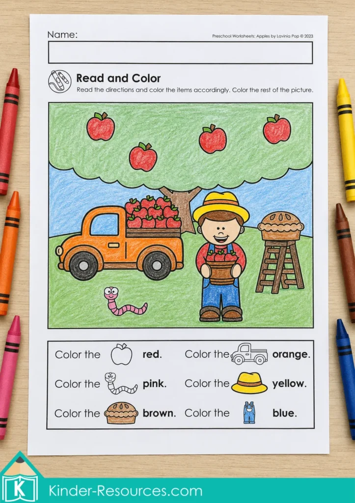 Apple read-and-color worksheet featuring an orchard scene colored according to simple picture directions.