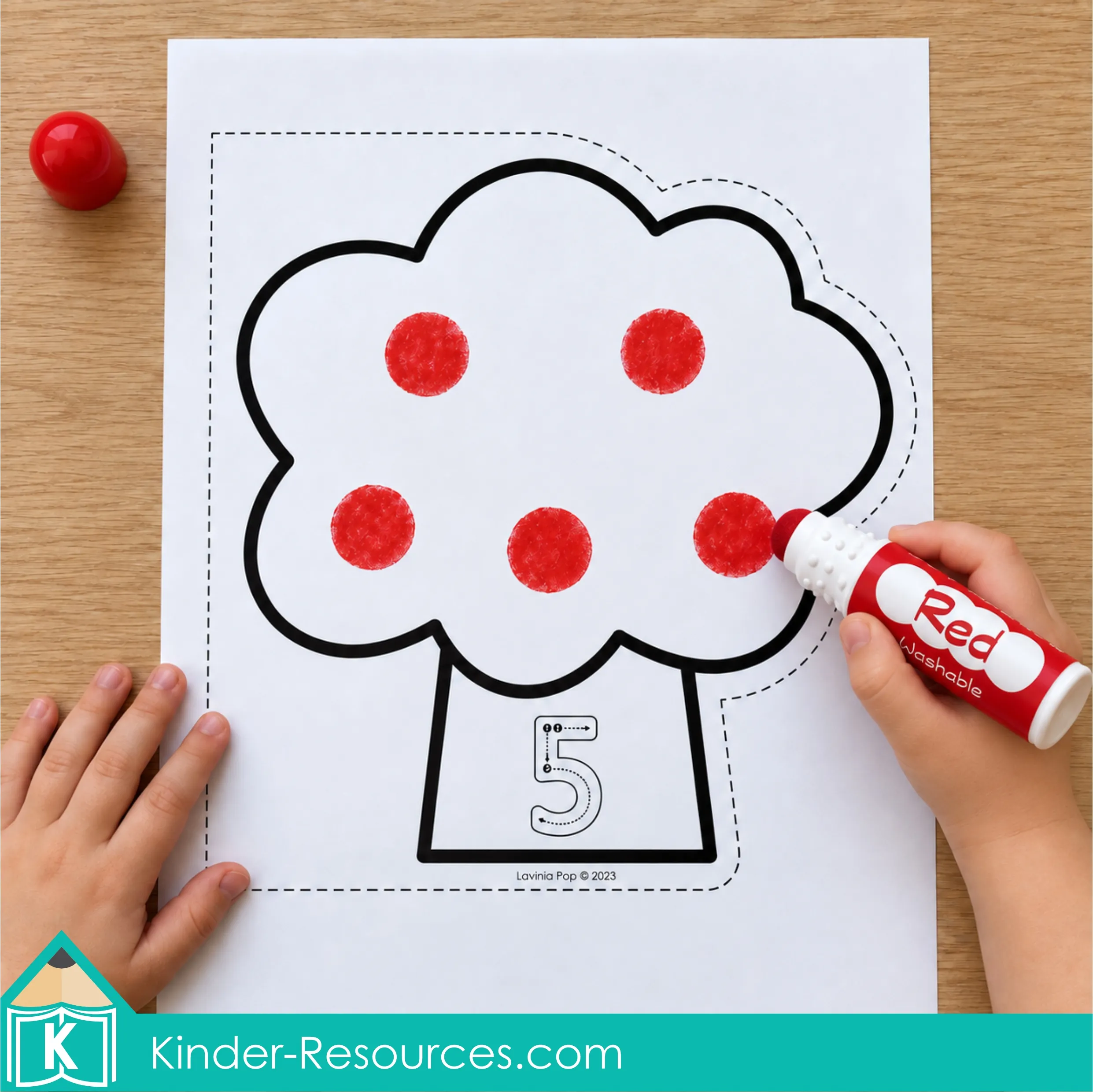 Apple tree counting activity with a child using a red bingo dabber to make five apples above the tracing numeral 5.