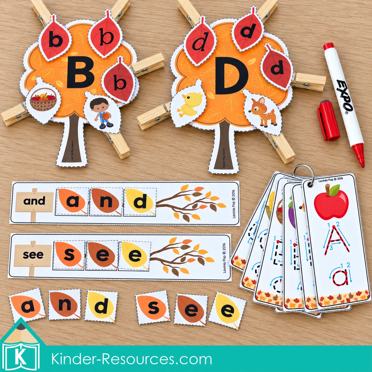 Fall preschool centers literacy setup with B and D trees, sight word strips, leaf letter tiles, and alphabet tracing card