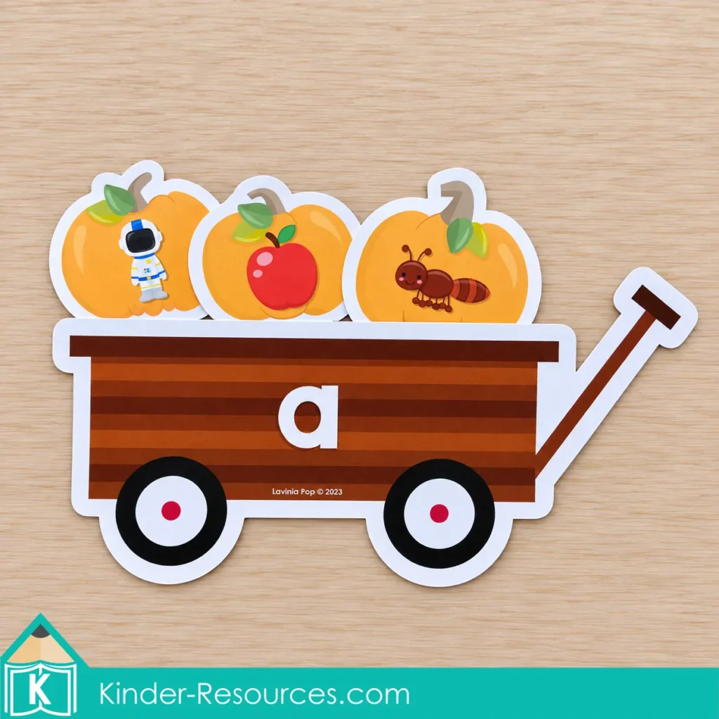 Pumpkin centers for preschool with picture pumpkins and letter wagons to sort beginning sounds and build letter and sound connections.