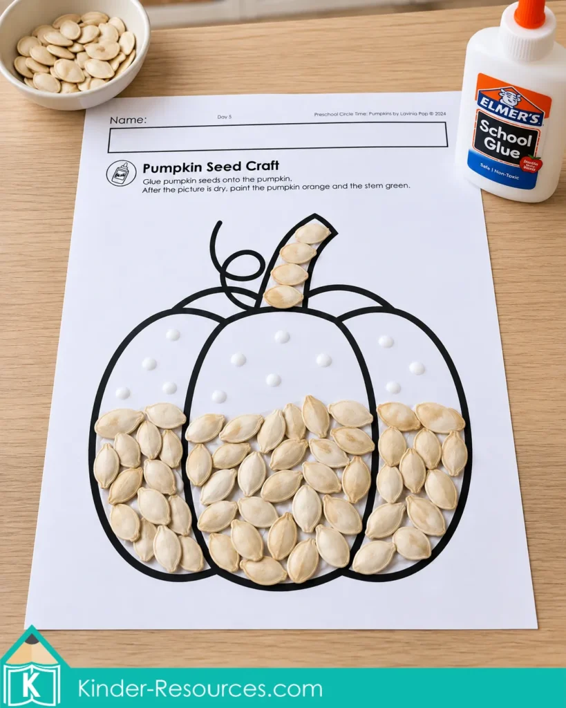 Pumpkin seed collage with seeds and glue for practicing careful placement and hand control during pumpkin circle time activities for preschool.