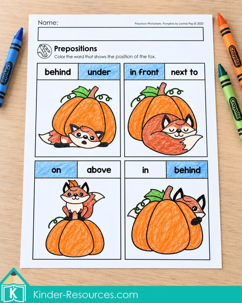 Pumpkin worksheets for preschool with fox pictures and colored answers for under, in front, on, and behind.