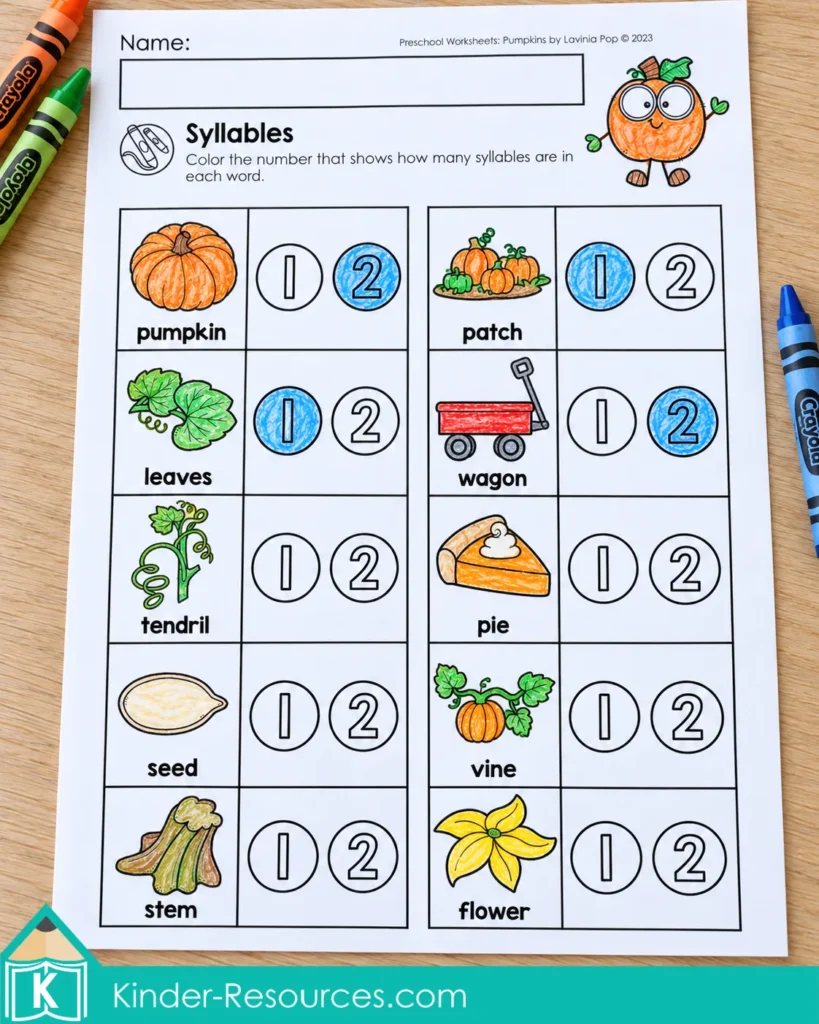 Pumpkin worksheets for preschool with fall picture words and colored number answers for syllable counting.