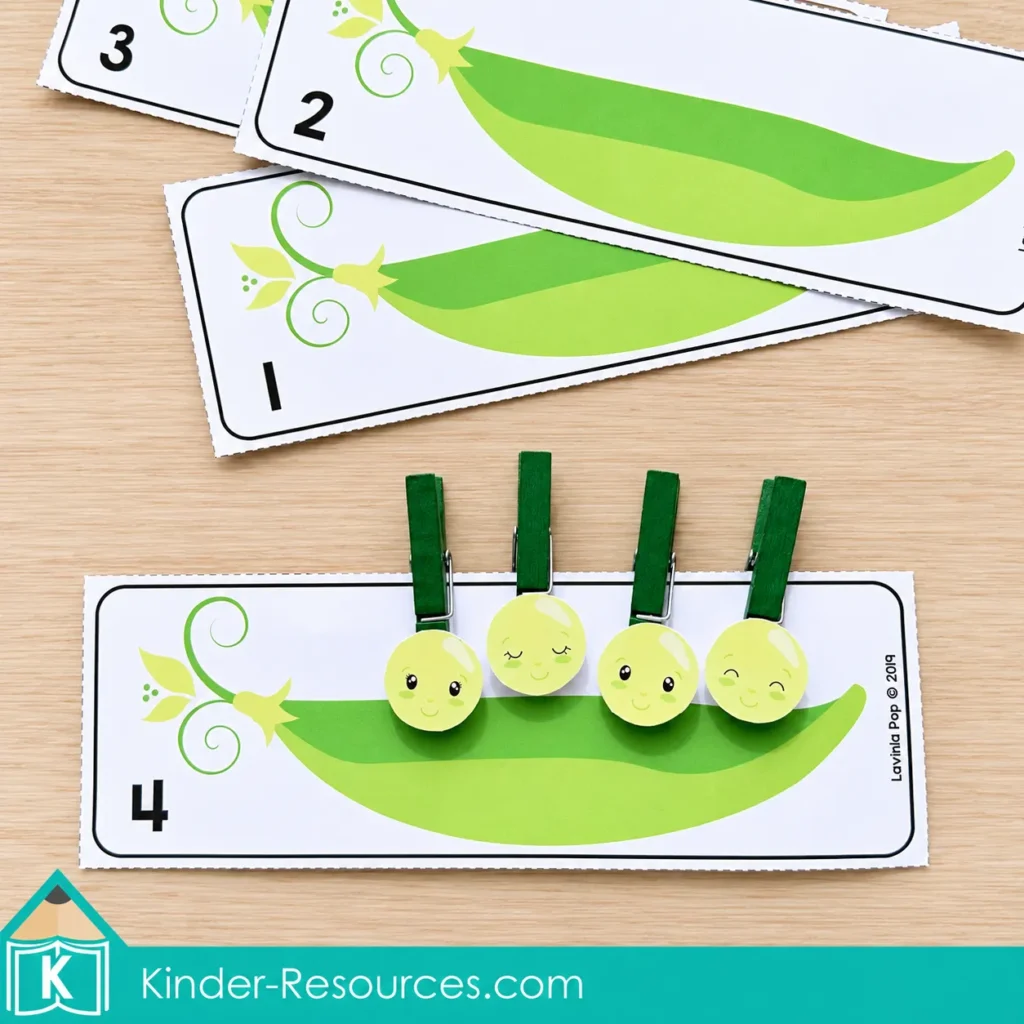 Four green clothespins with pea faces are clipped to a pea pod card numbered four, with cards one through three above.