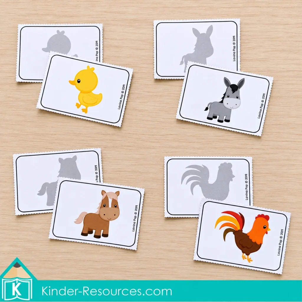 Picture cards of a duckling, donkey, horse, and rooster overlap their matching gray silhouette cards.