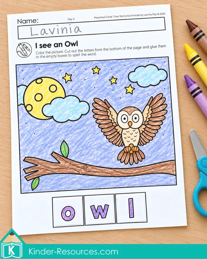 Completed owl worksheet with a crayon-colored nighttime scene and cut-out letters spelling owl.