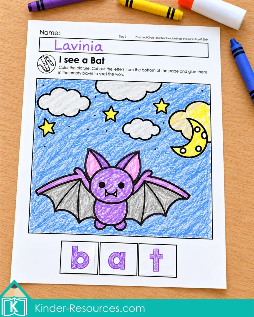 Completed bat worksheet with a purple bat, blue night sky and cut-out letters spelling bat.