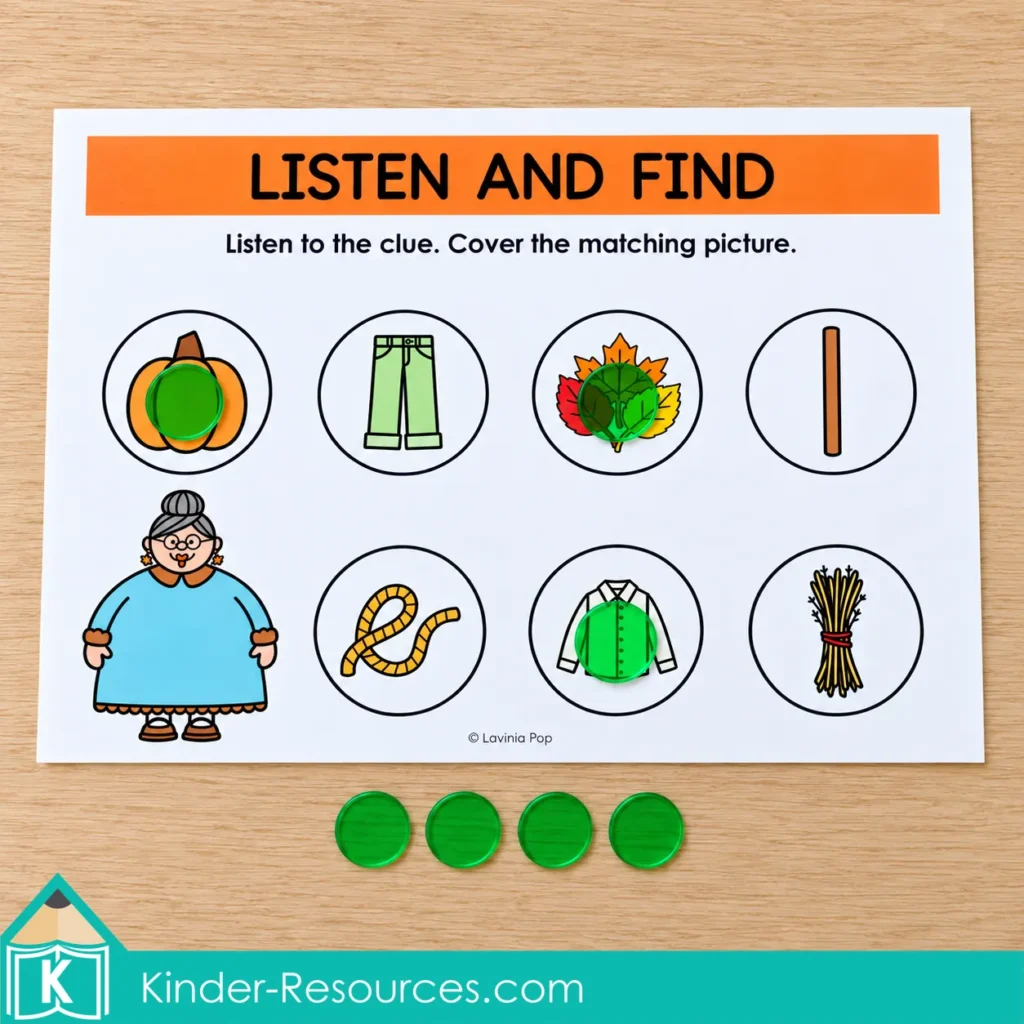 Listen and Find activity mat with green counters covering the pumpkin, leaves, and shirt pictures, and four loose counters below.